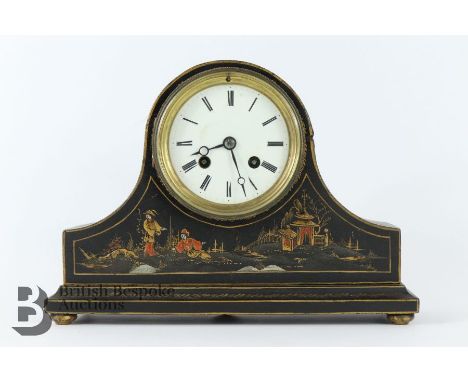 Japanned mantel clock, painted with figures in a landscape, the clock having a white face with Roman dial, Japy Freres moveme