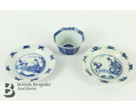 Pair of Chinese blue and white pin dishes, Kangxi (1662-1722) painted with buddhist symbolism to the border enclosing a scene