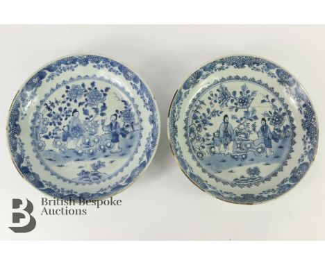 Pair of Chinese blue and white shallow bowls. The 18th century bowls having a fruit border enclosing a central scene - figure