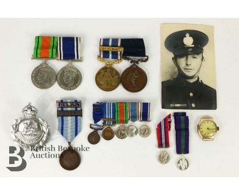 Collection of Police medals to W.A Rowley of the Merionethshire Police WWII Defence medal, Police Long Service medal, Royal H