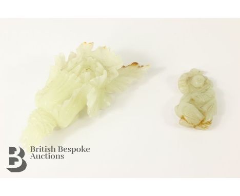 A Chinese carved jade cabbage, measures approx. 12 cms, together with a small jade carving of a man and a goose, measures app