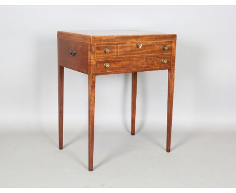 A late George III mahogany gentleman's washstand with ebony crossbanding and boxwood stringing, the hinged lid enclosing a co
