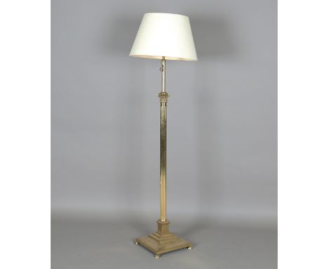 A 20th century gilt brass telescopic Corinthian column lamp standard, on a stepped square base, unextended height 160cm. Prov
