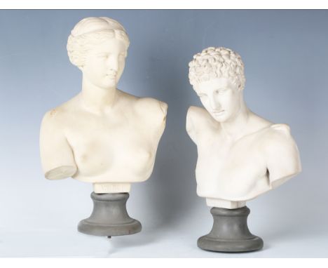 A pair of late 20th century moulded faux marble classical head and shoulders portrait busts, titled 'V di Milo' and 'Ermes', 