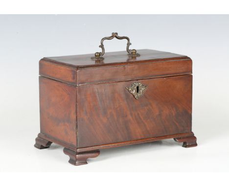 A George III figured mahogany tea caddy, the interior fitted with three removable tin canisters, on ogee bracket feet, width 