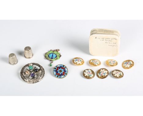 A small group of objects of virtu, including seven French gilt metal and enamel buttons, two silver thimbles and an Asian ena