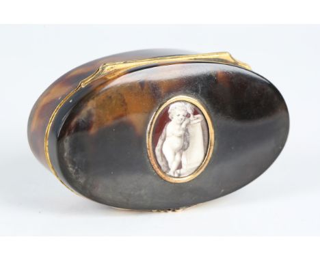 An early 19th century tortoiseshell and gold mounted oval snuff box, the hinged lid inset with an oval painted panel of a put