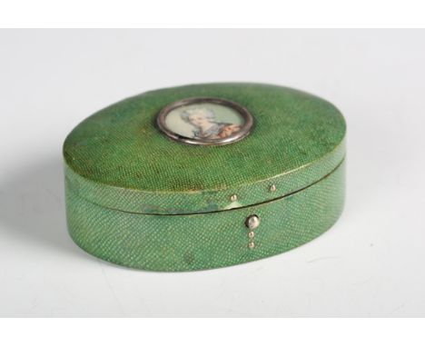 An early 20th century shagreen oval trinket box, the hinged lid inset with a portrait miniature of a lady, width 8.2cm.Buyer’