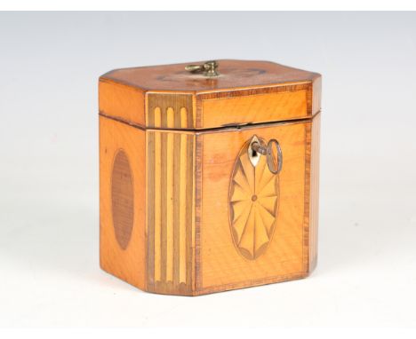 A George III satinwood and tulipwood crossbanded tea caddy with inlaid fan paterae, oval reserves and fluting, width 11.3cm. 