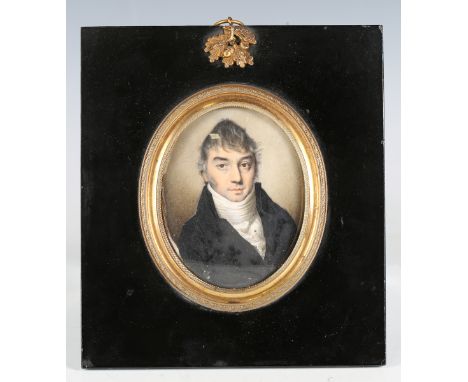 Circle of George Engleheart - a late 18th/early 19th century watercolour on ivory portrait miniature, depicting a gentleman w