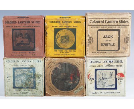 A small group of glass magic lantern slides, including boxed sets of children's stories.Buyer’s Premium 29.4% (including VAT 