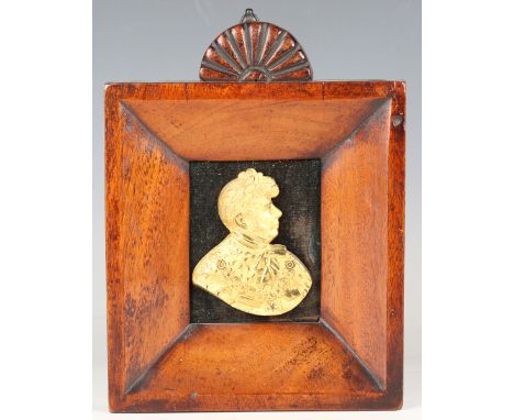 A 19th century gilt metal profile portrait plaque of George IV, mounted within a wide section mahogany frame, height 24cm, wi