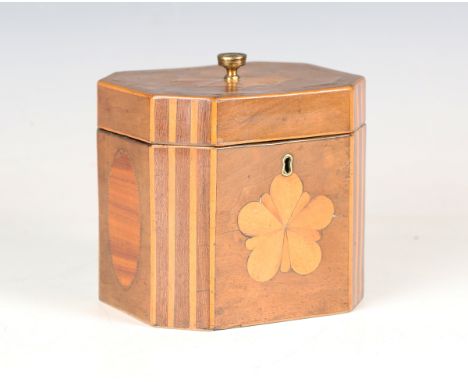 A George III walnut tea caddy with inlaid fan, oval reserves and star, within boxwood fluting and stringing, width 11.8cm. Pr