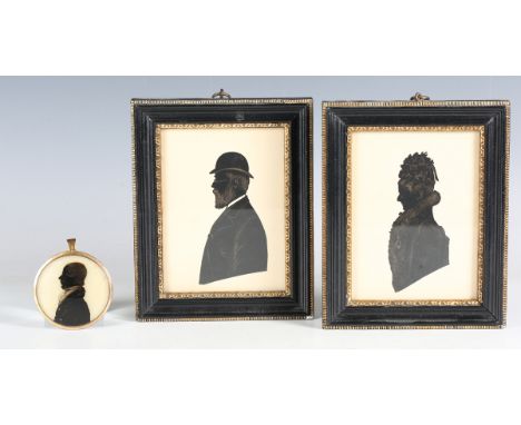 British School - a pair of late 19th century cut paper and ink silhouette portrait miniatures, depicting a lady and gentleman
