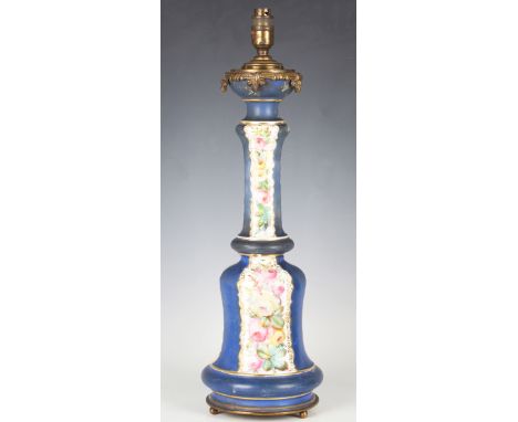 A late 19th century gilt metal mounted porcelain table lamp, painted with bands of roses on a blue ground, height 56cm, Prove