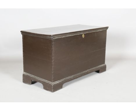 A Victorian painted pine trunk, the hinged lid revealing a candle box, on bracket feet, height 52cm, width 90cm, depth 44cm.B