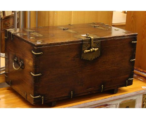 Stained and brass bound trunk, 36cm by 67cm.