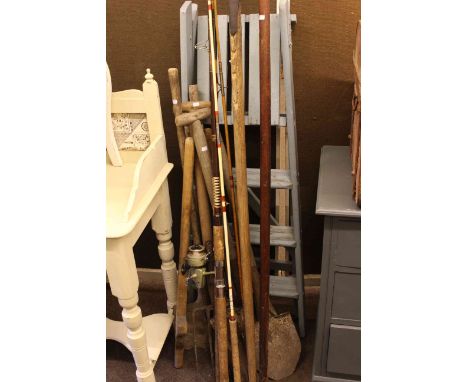 Fishing rods, garden tools, pair steps and tin trunk.