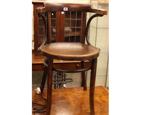 Bentwood elbow chair and two handled trunk.