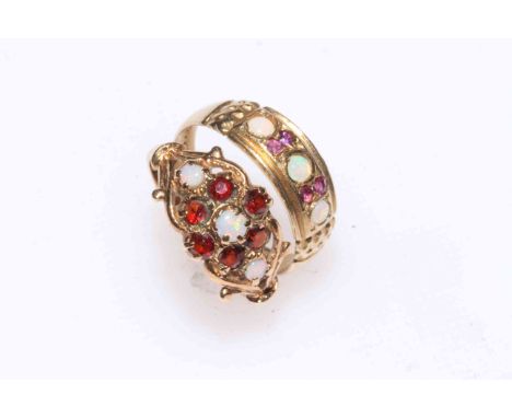 Two 9 carat gold, opal and garnet and opal and ruby rings.