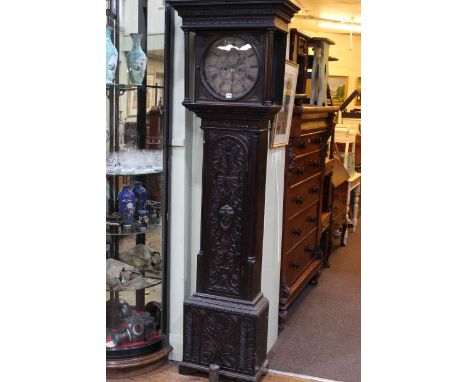 Antique carved oak longcase clock having circular dial, signed Stephen Simpson, Greta Bridge.