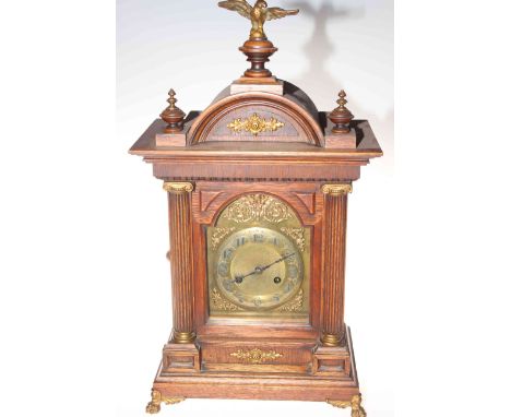 Oak brass and silvered dial mantel clock.