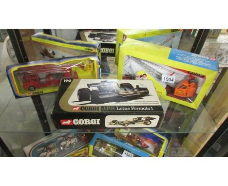 A boxed Corgi J P S Lotus Formula 1, 1153 Priestman boom crane with lift and a Simon Snorkel fire engine.