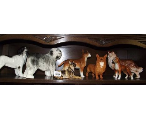 7 ceramic dogs (Beswick Corgi has damaged ear)