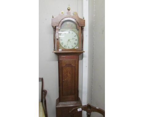 An oak cased Grandfather clock with mid 19th century painted dial.