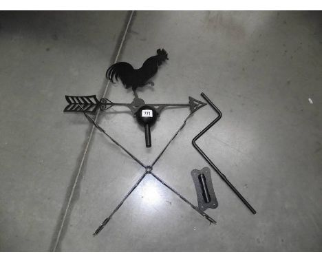 A black powder coated weather vane.
