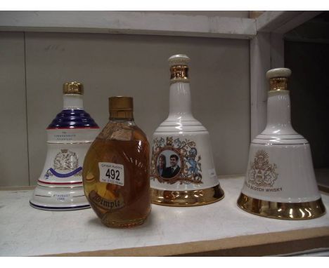 Three Royalty related Wade whisky bells with contents and a vintage bottle of Dimple whisky.