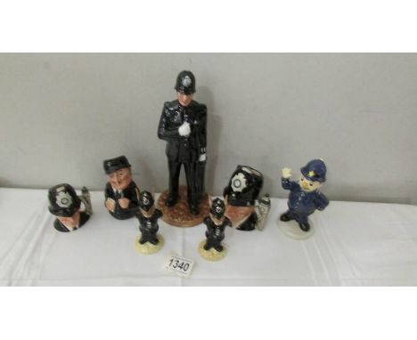 A collection of Doulton police related figures including jugs, Sgt Peeler, Bunnikins, Classics and Mr Plod (Uk exclusive).