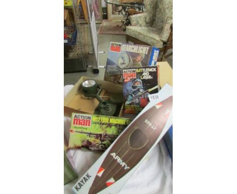 A boxed action man search light, battle pack, laser belt feed machine gun together with a Cherilia Kayak.