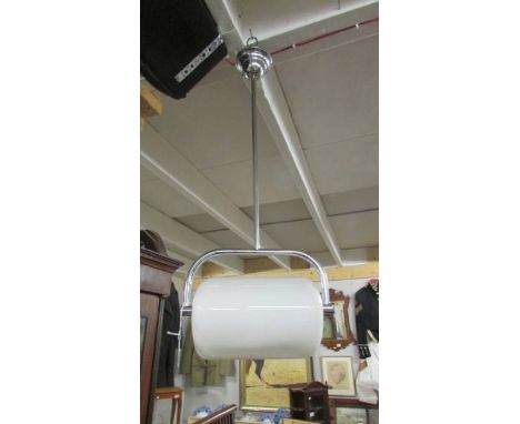 A chrome art deco ceiling light with glass shade.