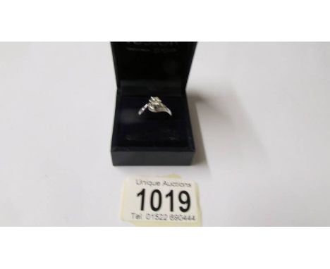 An 18ct white gold single stone diamond ring of approximately 45 points, size O.