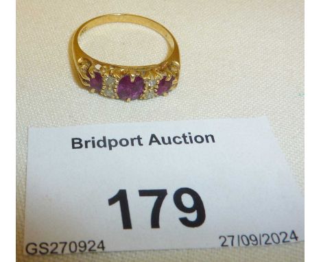 18ct gold ruby and diamond ring approx. UK size N and weight 3g.