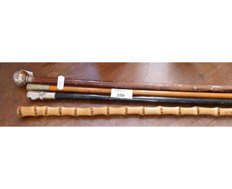 Royal Engineers swagger stick, a similar for the Welch Regiment and St Johns Ambulance together with a copper coaching horn