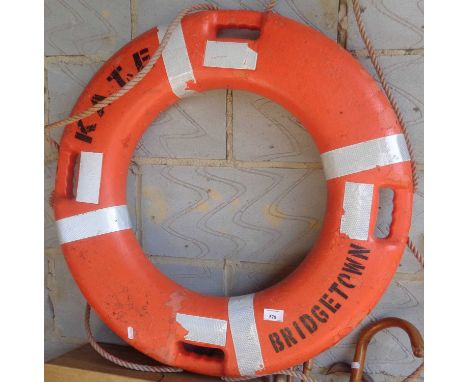 Vintage life belt painted "Kate" out of Bridgetown