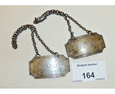 Pair of silver decanter or bottle labels, BRANDY and WHISKY. Hallmarked for Birmingham 1972 - H. Bros.
