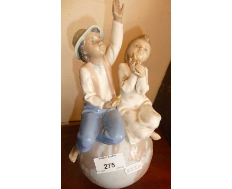 Lladro Unicef "wishing every child a better world" figurine (boxed) and an Arte Romera figural group of a girl, a dog and a t
