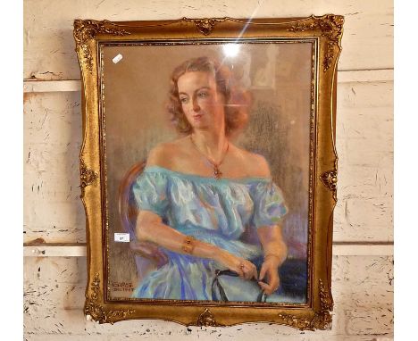 A portrait in pastels of a lady, monogrammed with G.P.S dated 1947 in gilt frame 30" x 25"