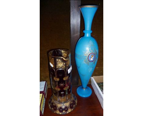 Finely cut and gilded Bohemian ruby glass jug on footed base (approx 30cm high) and a tall Persian turquoise glass vase with 