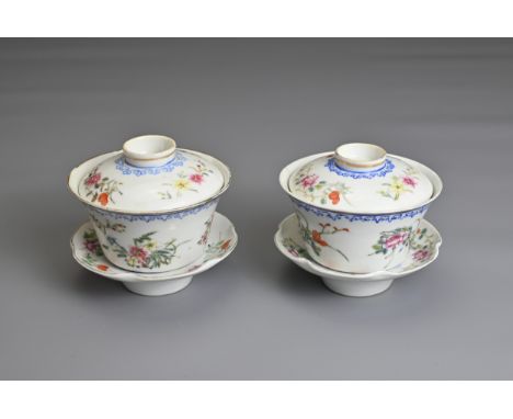 A PAIR OF CHINESE FAMILLE ROSE CUPS AND STANDS, EARLY 20TH CENTURY. Finley potted cups with enamel decoration of floral spray