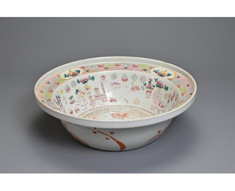 A LARGE CHINESE FAMILLE ROSE ENAMELLED PORCELAIN BASIN, 19TH CENTURY. Rounded body with stepped rim, decorated with goldfish 