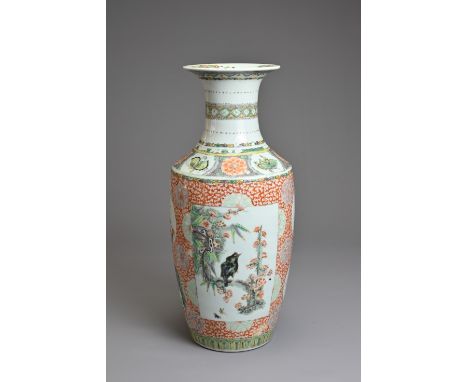 A CHINESE FAMILLE ROSE PORCELAIN VASE, 19TH CENTURY.   Of baluster form decorated with rectangular panels and roundels with b