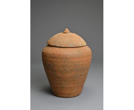 A CHINESE BUDDHIST SANSKRIT POTTERY JAR, SONG / YUAN DYNASTY. The exterior decorated with incised Sanskrit type characters pr