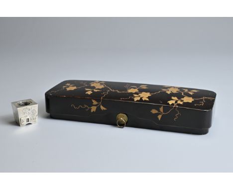 A JAPANESE MEIJI PERIOD (1868-1912) BLACK AND GOLD LACQUER LETTER BOX (FUBAKO) AND A STERLING SILVER INKWELL WITH GLASS LINER