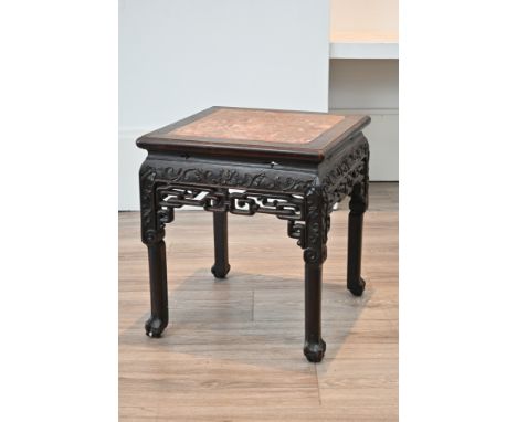 A 19TH CENTURY CHINESE CARVED HARDWOOD MARBLE-TOPPED LOW TABLE OR JARDINIERE STAND. The square top inset with red marble, abo