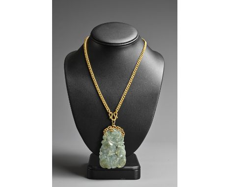A HIGH KARAT GOLD CHAIN WITH JADE PENDANT, 56.5 GRAMS GOLD. A yellow gold chain stamped 18K on the loop mount, rubbed mark to