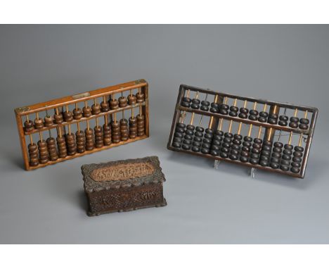 A CHINESE CARVED SANDALWOOD BOX AND COVER WITH ABACUS, 19/20TH CENTURY. The box well carved in relief with figures in landsca